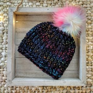 Navy blue and rainbow hat with rainbow pom-pom